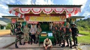 Danpos Gabma Long Midang Amankan Pengedar Miras di Titik 0 Perbatasan RI – Malaysia